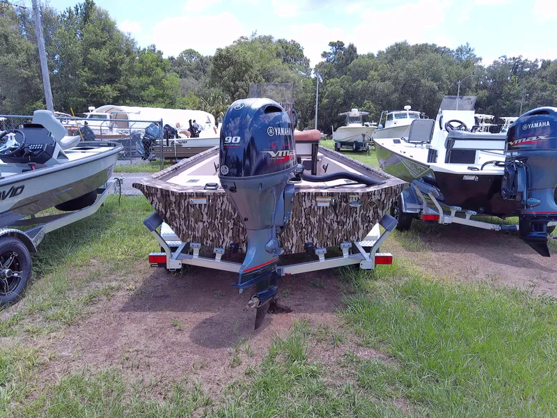 Slide: The Image of Avid 18 Rogue 2023 boat with Yamaha 90 outboard motor on trailer. - 3