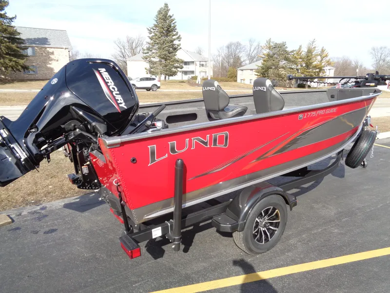 Slide: The Image of 2023 Lund 1775 Pro Guide fishing boat with Mercury outboard motor. - 11