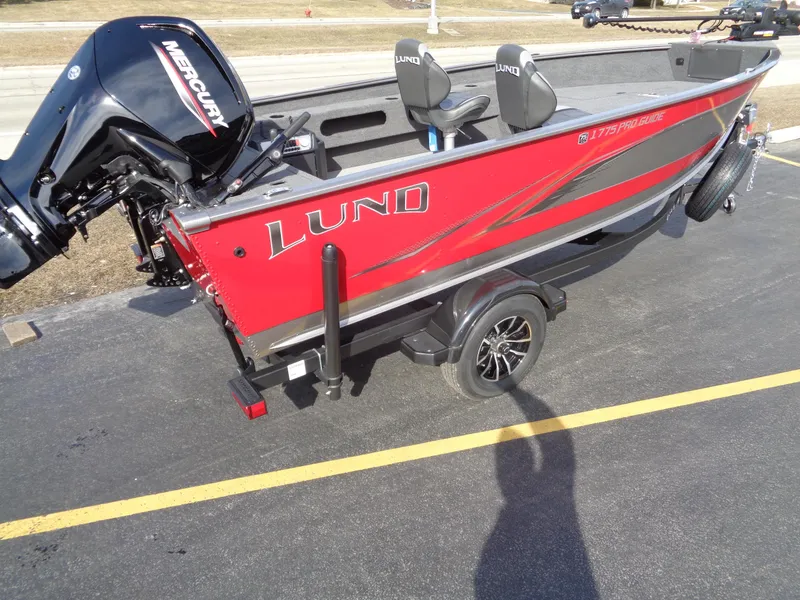 Slide: The Image of 2023 Lund 1775 Pro Guide fishing boat with Mercury outboard motor. - 3