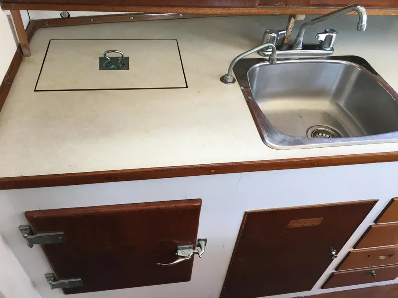 Slide: The Image of Galley w/electric fridge & stainless sink - 11