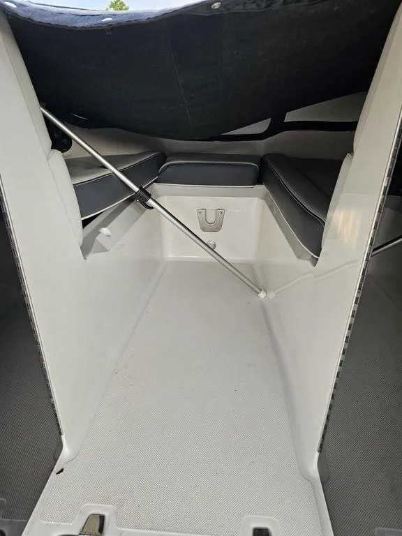 Slide: The Image of 2017 Regal 23 OBX boat interior with seating and storage. - 7