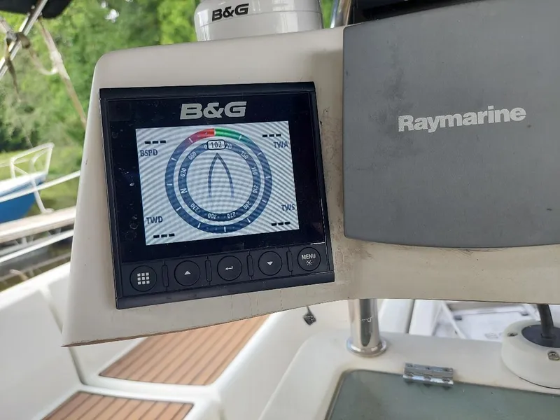 Slide: The Image of B&G navigation display on 1995 Beneteau Oceanis 351 sailboat, showing compass and wind data. - 30