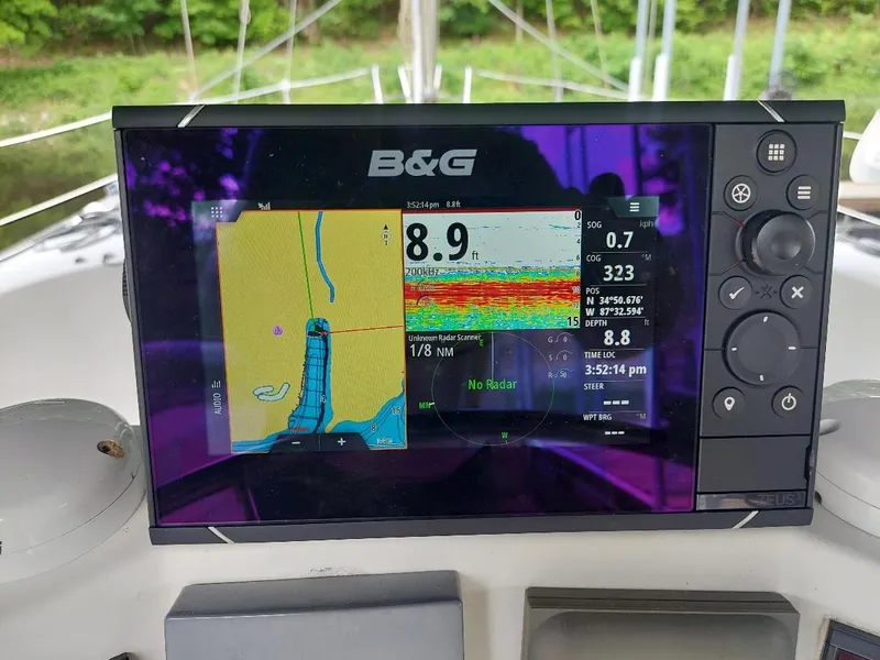 Slide: The Image of B&G navigation display on 1995 Beneteau Oceanis 351 sailboat, showing map and sonar data. - 32