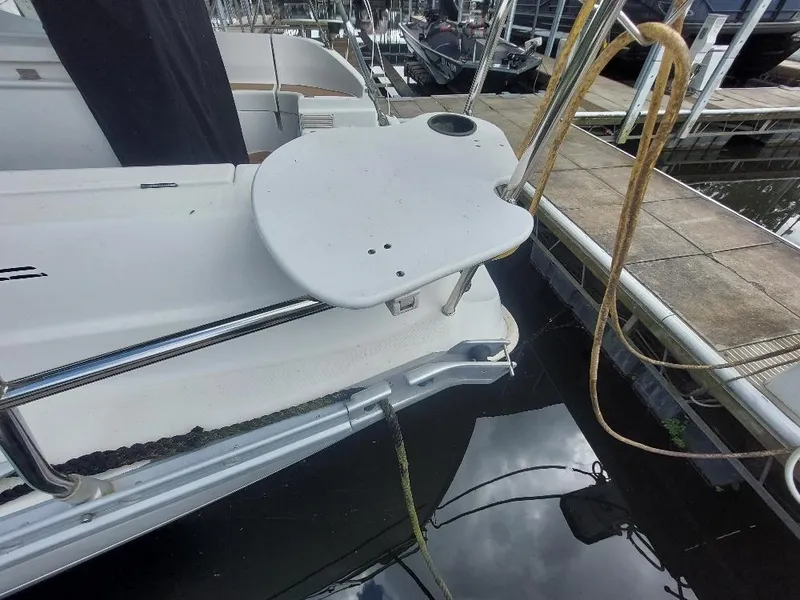 Slide: The Image of 1995 Beneteau Oceanis 351 sailboat stern view at marina dock. - 4