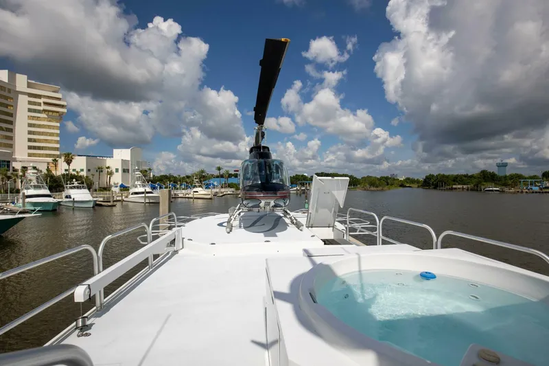 Slide: The Image of Broward 108 Cockpit Motor Yacht 1983 with helicopter and jacuzzi on deck. - 39