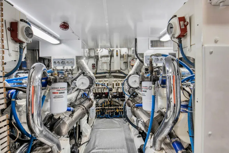 Slide: The Image of Engine room of 1983 Broward 108 Cockpit Motor Yacht with Detroit Diesel engines. - 44