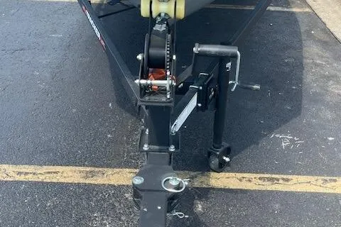 Slide: The Image of 2024 Tracker Pro Team 190 TX boat trailer hitch on asphalt parking lot. - 4
