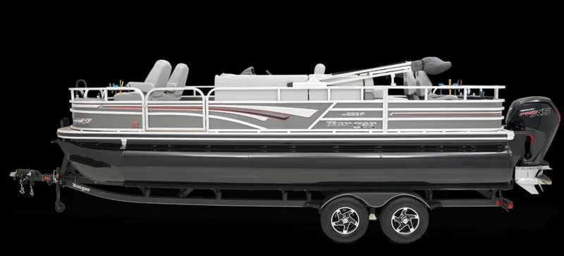 Slide: The Image of 2024 Ranger Reata 223F pontoon boat on trailer, side view. - 7