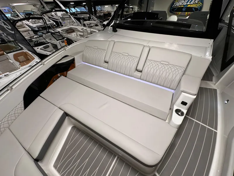Slide: The Image of 2023 Sea Ray Sundancer 370 OB interior with luxurious seating and modern design. - 14