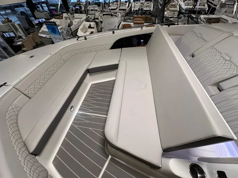 Slide: The Image of 2023 Sea Ray Sundancer 370 OB interior seating area with elegant design and spacious layout. - 16