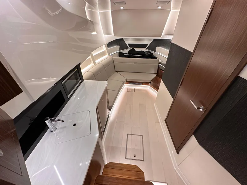Slide: The Image of Luxurious interior of 2023 Sea Ray Sundancer 370 OB yacht with modern amenities. - 17