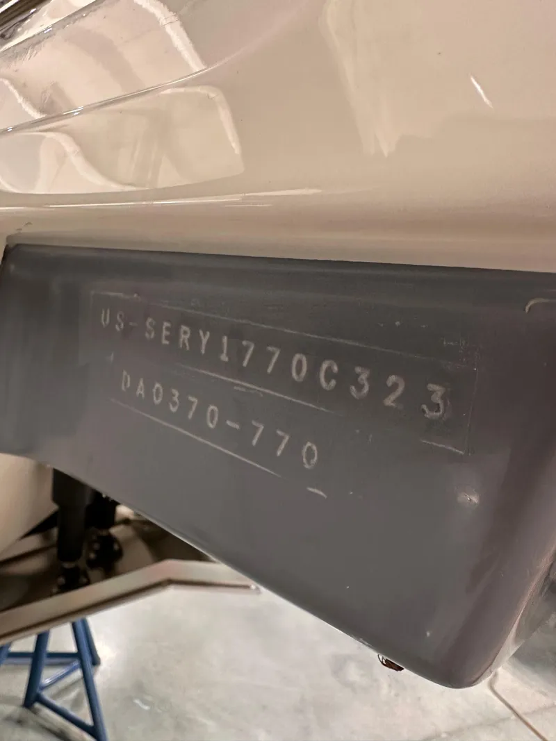 Slide: The Image of 2023 Sea Ray Sundancer 370 OB hull identification number detail. - 30