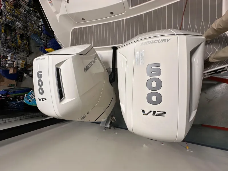 Slide: The Image of 2023 Sea Ray Sundancer 370 OB with twin Mercury 600 V12 engines. - 33