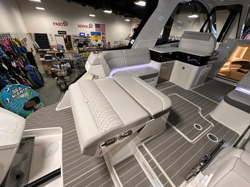 Slide: The Image of 2023 Sea Ray Sundancer 370 OB interior with luxurious seating and modern design. - 36
