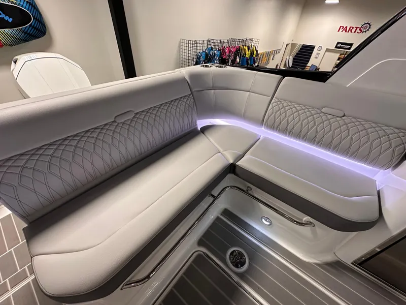 Slide: The Image of Luxurious seating area in 2023 Sea Ray Sundancer 370 OB boat with ambient lighting. - 38