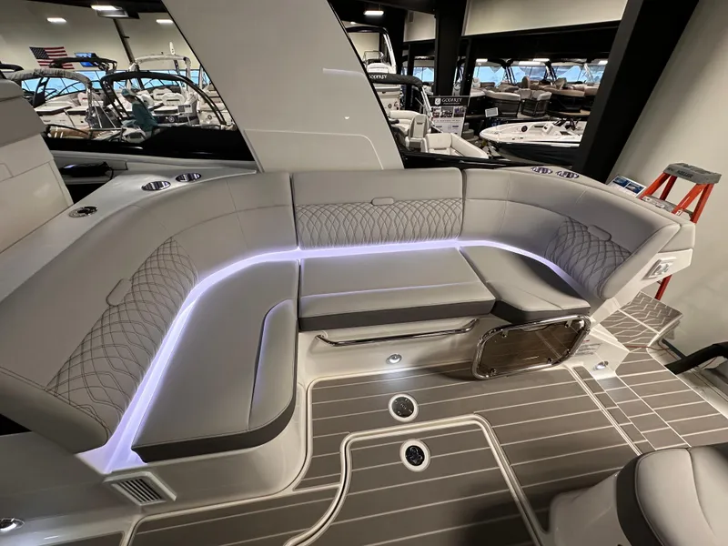 Slide: The Image of Luxurious seating area on 2023 Sea Ray Sundancer 370 OB with ambient lighting. - 41