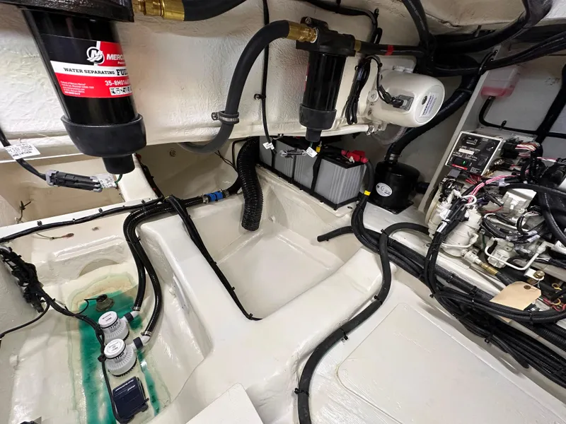 Slide: The Image of Engine compartment of 2023 Sea Ray Sundancer 370 OB with wiring and components. - 44