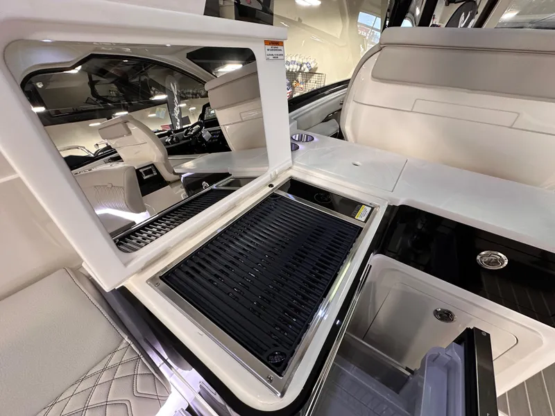 Slide: The Image of 2023 Sea Ray Sundancer 370 OB interior with sleek, modern design and luxurious amenities. - 48