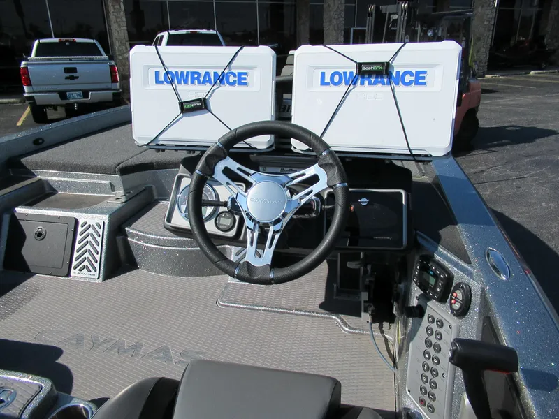 Slide: The Image of 2021 Caymas CX21 Pro boat dashboard with Lowrance electronics. - 2