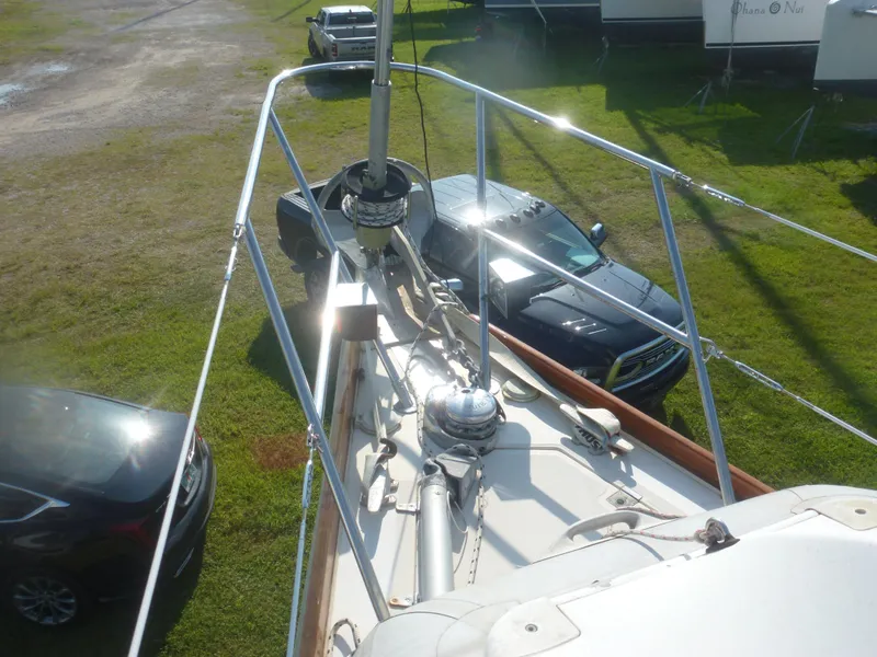 Slide: The Image of View from the deck of a 1990 Sabre 425 sailboat in a storage yard. - 13