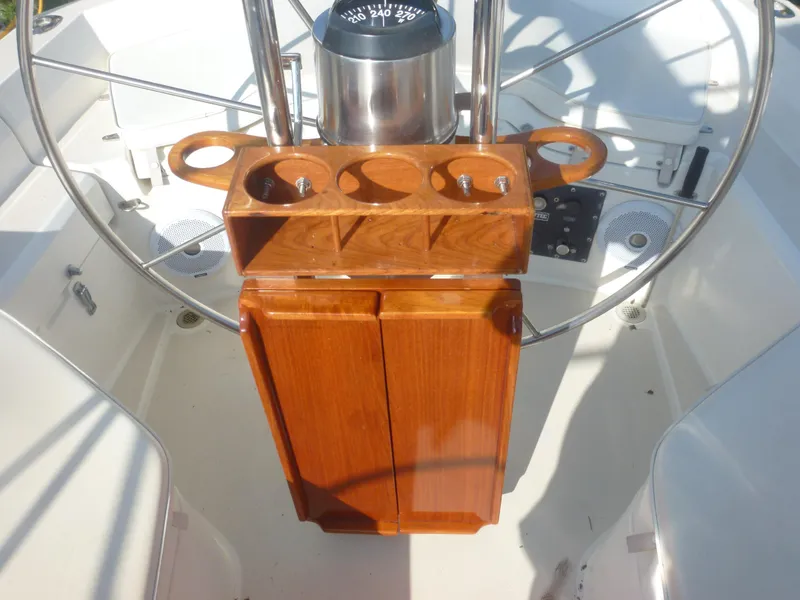 Slide: The Image of Cockpit of 1990 Sabre 425 sailboat with wooden helm station and compass. - 19