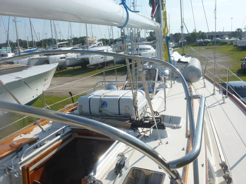 Slide: The Image of Sabre 425 sailboat deck view, 1990 model, docked in a marina. - 26