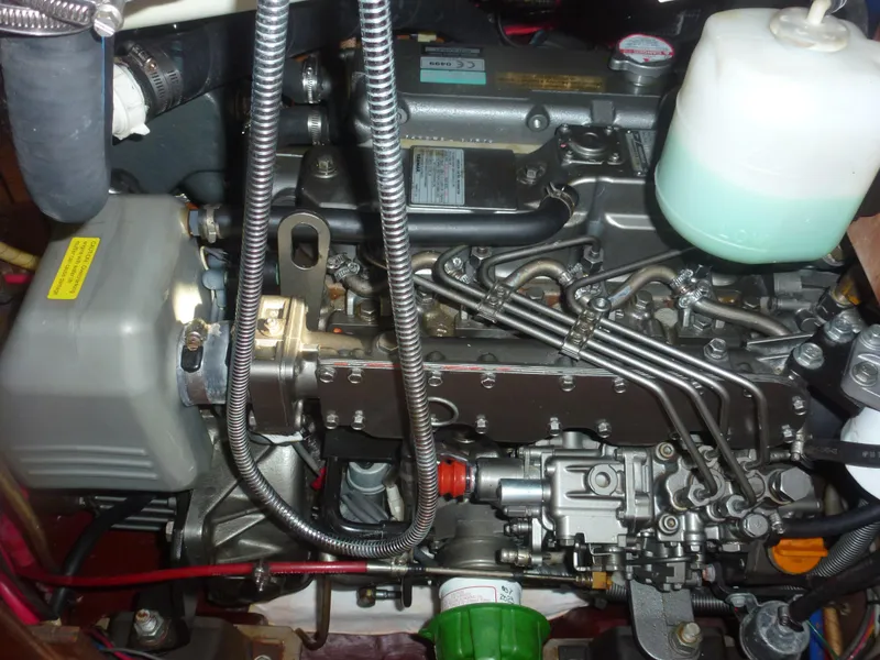 Slide: The Image of 1990 Sabre 425 engine close-up, detailed view of components and wiring. - 44