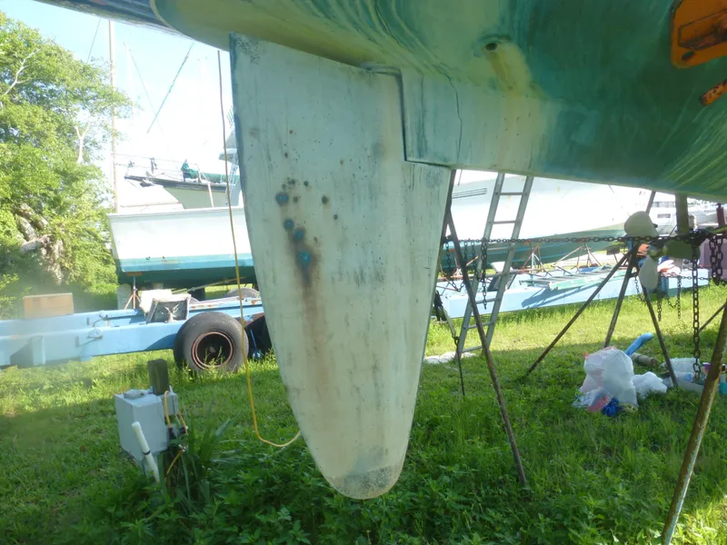 Slide: The Image of 1990 Sabre 425 sailboat keel on dry dock for maintenance. - 9