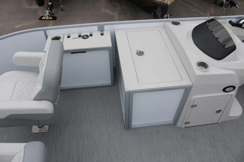 Slide: The Image of 2023 Lowe SF232 Sport Fish boat interior with seating and storage compartments. - 5