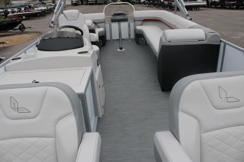 Slide: The Image of 2023 Lowe SF232 Sport Fish pontoon boat interior with spacious seating and modern design. - 7