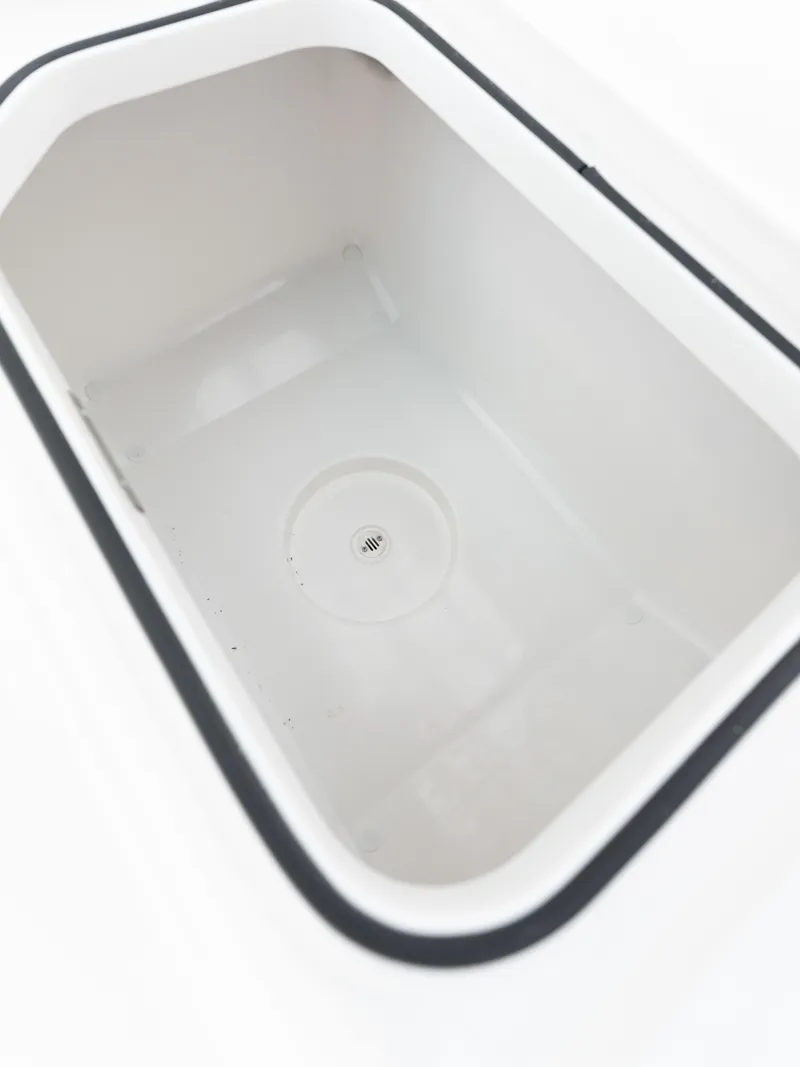 Slide: The Image of 2024 Caymas 28 Hybrid boat storage compartment. - 22