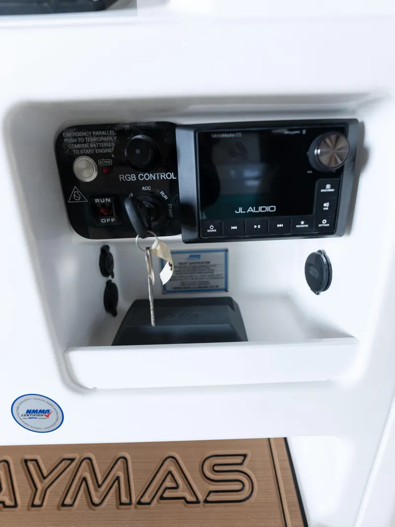 Slide: The Image of Control panel of 2024 Caymas 28 Hybrid boat with JL Audio system. - 36