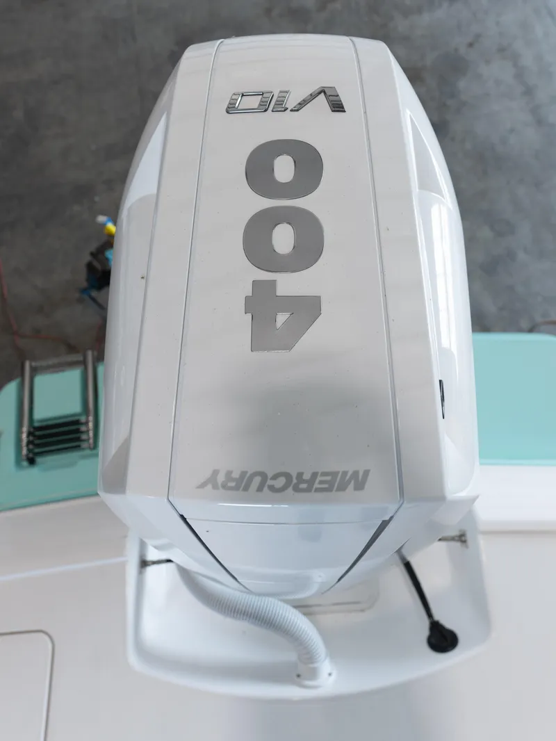 Slide: The Image of 2024 Caymas 28 Hybrid with Mercury 400 V10 outboard engine. - 47