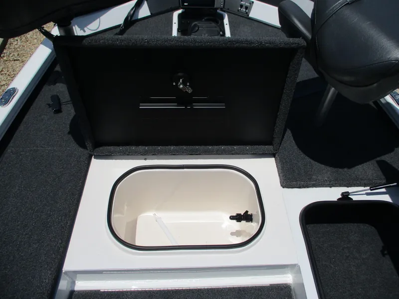Slide: The Image of 2023 Vexus AVX181 boat storage compartment with open lid. - 11