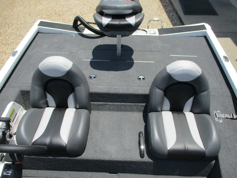 Slide: The Image of 2023 Vexus AVX181 boat interior with three black and white seats. - 12