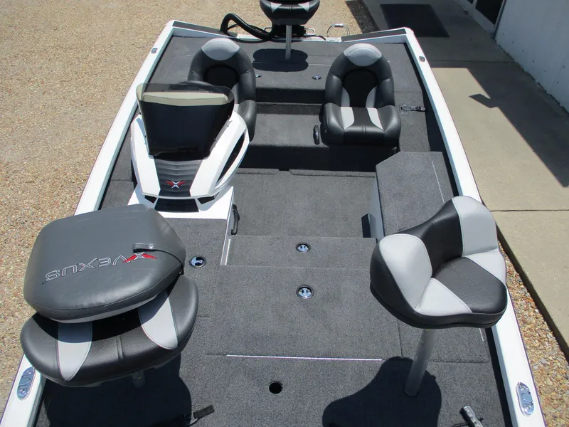 Slide: The Image of 2023 Vexus AVX181 boat interior with seating and storage compartments. - 16