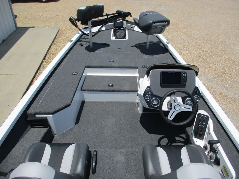Slide: The Image of 2023 Vexus AVX181 fishing boat interior with steering console and seating. - 9