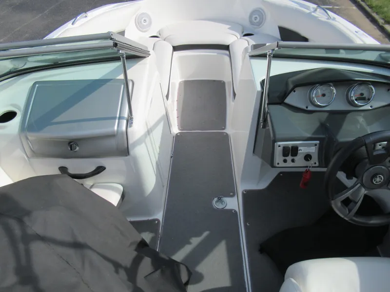 Slide: The Image of 2013 Yamaha Boats AR190 interior cockpit with steering wheel and dashboard. - 14