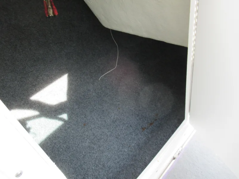 Slide: The Image of Interior carpeted storage area of 2013 Yamaha Boats AR190. - 18