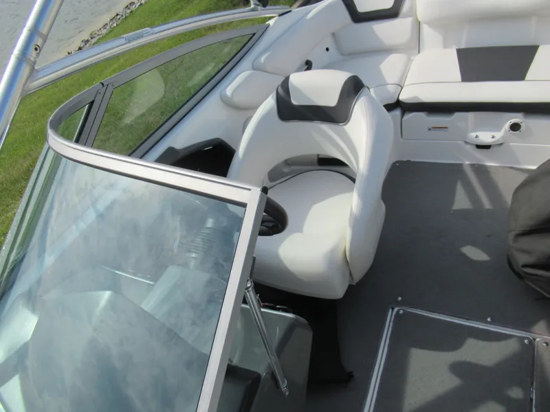 Slide: The Image of 2013 Yamaha Boats AR190 interior with white and black seating. - 23