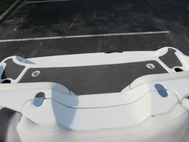 Slide: The Image of 2013 Yamaha Boats AR190 swim platform in a parking lot. - 25