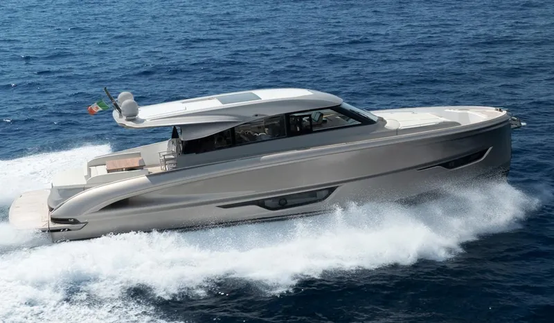 Slide: The Image of 2025 Solaris 52 Coupe yacht cruising on open sea, showcasing sleek design and luxury. - 3