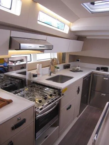 Slide: The Image of Modern kitchen in 2024 Jeanneau 55 yacht with stainless steel appliances. - 29