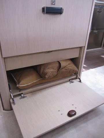 Slide: The Image of Storage compartment with pillows in 2024 Jeanneau 55 yacht interior. - 39