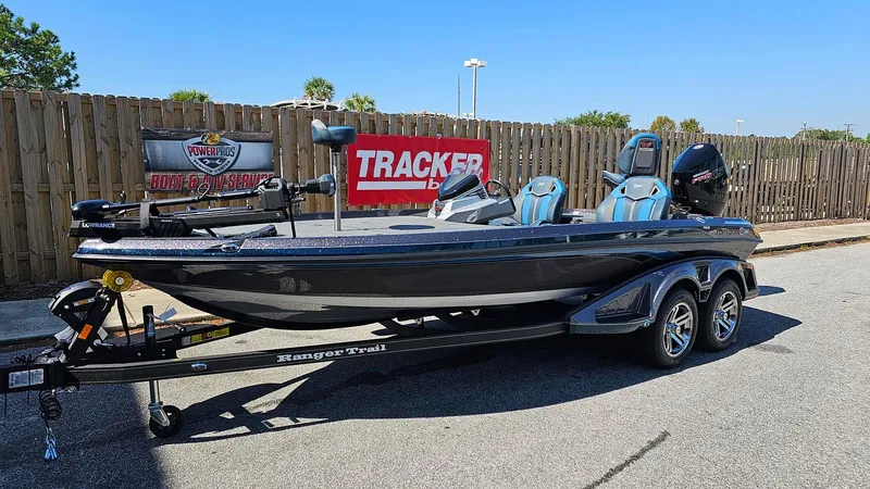 Slide: The Image of 2024 Ranger Z520R Ranger Cup Equipped boat on trailer, parked outdoors. - 1