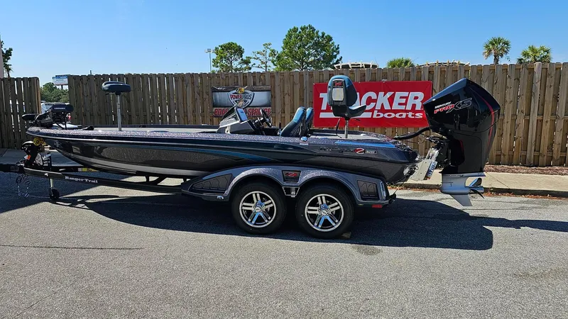 Slide: The Image of 2024 Ranger Z520R Ranger Cup Equipped bass boat on trailer. - 2