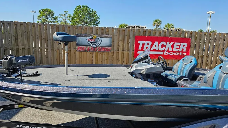 Slide: The Image of 2024 Ranger Z520R Ranger Cup Equipped boat on display with Tracker Boats banner. - 8