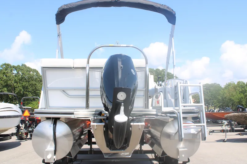 Slide: The Image of 2023 Lowe SS190 Super Sport pontoon boat rear view with outboard motor. - 3