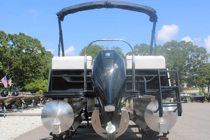 Slide: The Image of 2023 Lowe SS230 Super Sport pontoon boat rear view with outboard motor. - 3