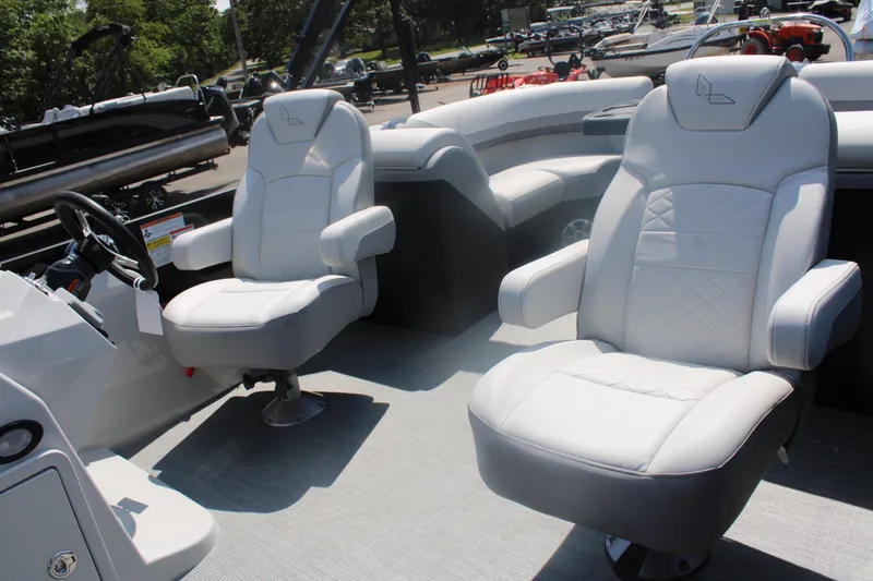 Slide: The Image of 2023 Lowe SS230 Super Sport boat interior with plush seating and modern design. - 9